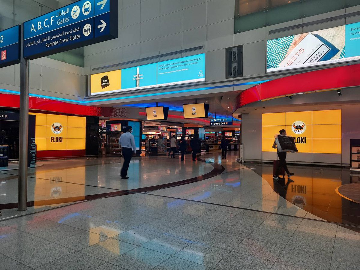 FLOKI's tweet photo. #FLOKI's aggressive marketing campaign aimed at the Middle East started with Dubai today!

It is impossible to walk around the Dubai International Airport without seeing the $FLOKI brand.

This campaign which will run for 1 month will be seen over 25.7 million times! https://t.co/nc47nQVim1