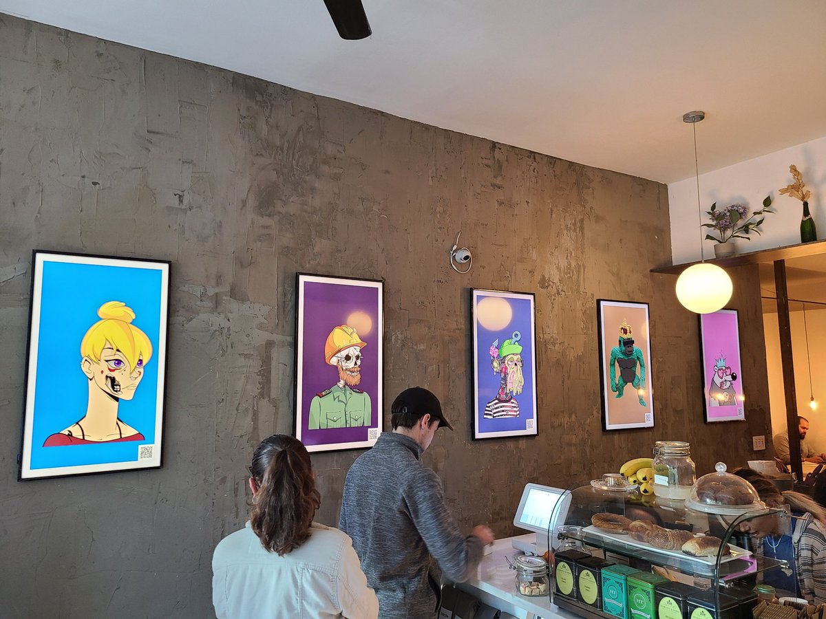PackripEwing's tweet photo. A friend of mine just sent me this — NFT x NYC takeover in full force. 

📍Lions Milk Coffee Shop in Williamsburg, Brooklyn https://t.co/9F6mM3WqW6