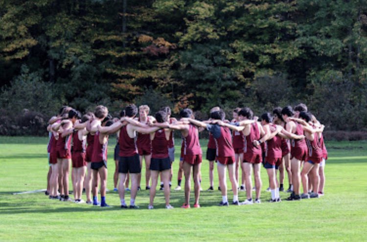 pptach's tweet photo. Don and I are starting to figure out how to navigate the long distance system.  O still wearing long shorts and his Academy socks!!!  #crosscountry #trackandfield #phillipsexeter #gobigred #neverforgetwhereyoucamefrom https://t.co/HfOgBYcG3e