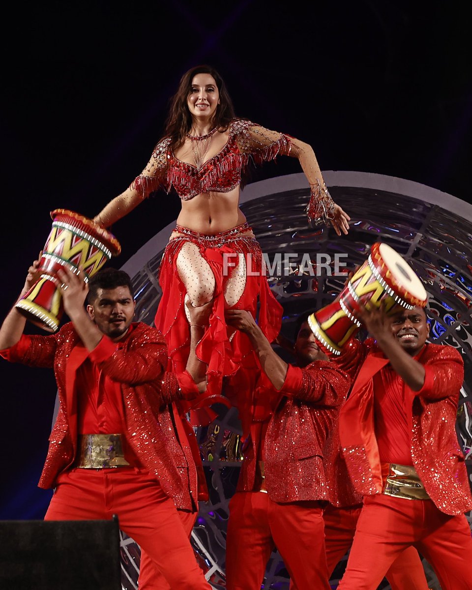 filmfare's tweet photo. Red hot is just an understatement at this point for #NoraFatehi. #FFMEAchievers https://t.co/tlvrCjDzBJ