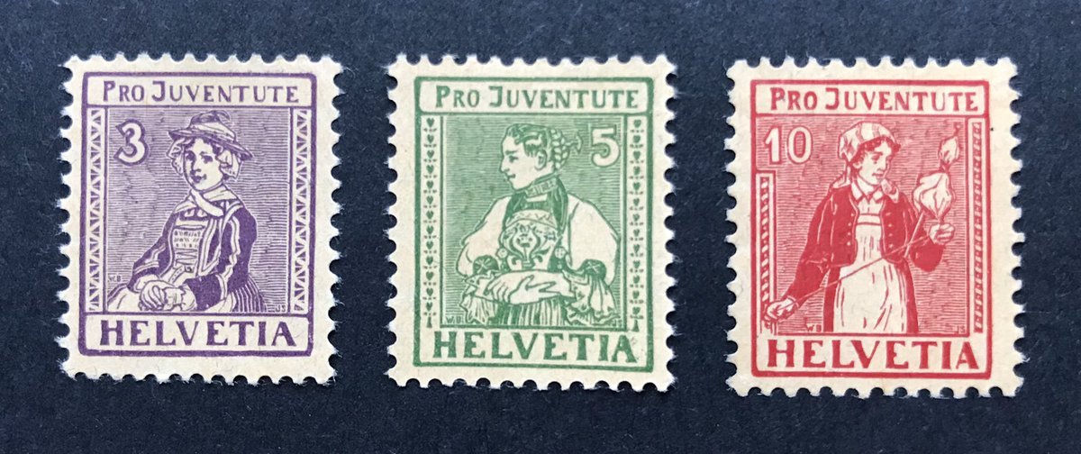 SwissPhilately's tweet photo. Pretty Pro Juventute semipostals. Issued 1/12/1917. Girls wearing traditional costumes for the 3 cantons: Valais, Unterwalden &amp; Ticino. The charity surtax wasn’t printed on Pro Juventute stamps until 1937. Earlier 3 Cent stamps had a surtax of 2C. 5-20C. was 5C. 30-40C. was 10C. https://t.co/2eG4hZksMi