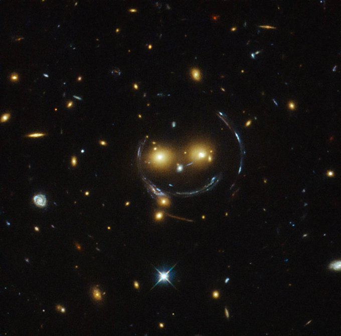 konstructivizm's tweet photo. This smiley face was captured by Hubble. NASA/ESA https://t.co/4ATbQQh5Jv