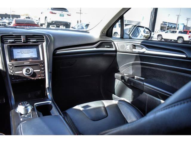 RyanONealAutos's tweet photo. Are you ready to turn heads🤩in this pre-owned 2018 #Ford #Fusion Titanium🚨?! Nimble and precise⚡️, this sedan delivers a composed ride that's comfortable☁️for all-day trips🛣while scoring near 31mpg on the highway😎! 
Check it out today➡️: https://t.co/X7wpdALQcA
#ryanoneil https://t.co/gQr6RN6mz7