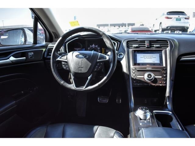 RyanONealAutos's tweet photo. Are you ready to turn heads🤩in this pre-owned 2018 #Ford #Fusion Titanium🚨?! Nimble and precise⚡️, this sedan delivers a composed ride that's comfortable☁️for all-day trips🛣while scoring near 31mpg on the highway😎! 
Check it out today➡️: https://t.co/X7wpdALQcA
#ryanoneil https://t.co/gQr6RN6mz7