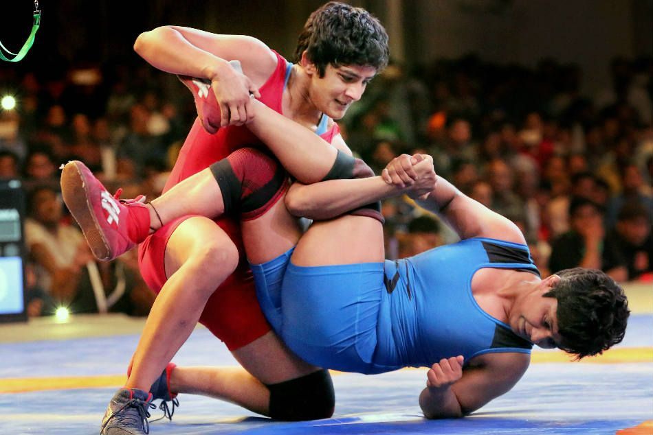 ONEChampionship's tweet photo. Then vs. Now 🤼‍♀️ Wrestling superstar Ritu Phogat is not going anywhere until she earns GOLD! 🇮🇳🐯 @PhogatRitu #WeAreONE #ONEChampionship https://t.co/caIl3B5Zeu