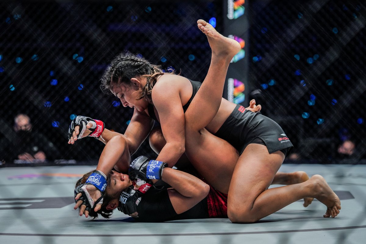 ONEChampionship's tweet photo. Then vs. Now 🤼‍♀️ Wrestling superstar Ritu Phogat is not going anywhere until she earns GOLD! 🇮🇳🐯 @PhogatRitu #WeAreONE #ONEChampionship https://t.co/caIl3B5Zeu