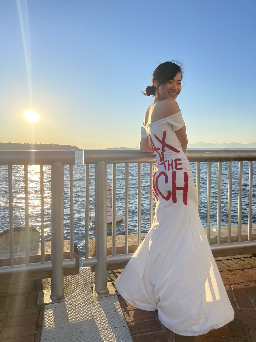 ashding2's tweet photo. Bridesmaid in the front, anti-big business in the back 👌🏼 @AOC @BernieSanders https://t.co/WwBct09dvw