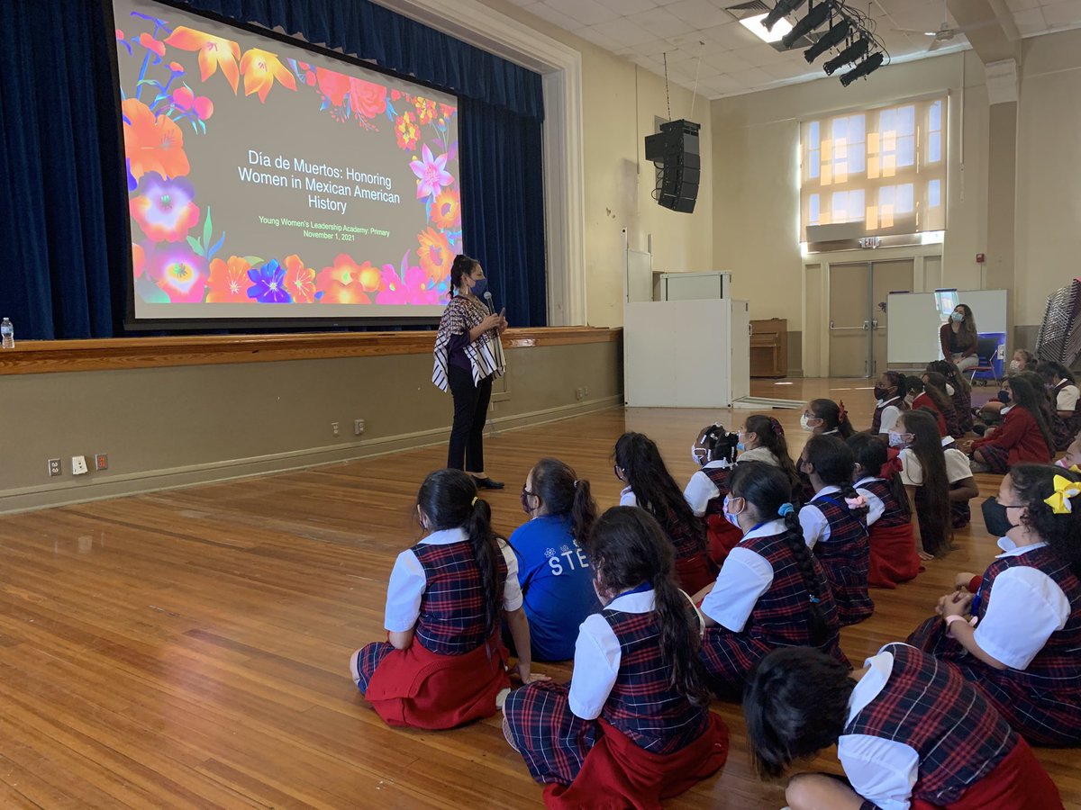 Dr. Lilliana Saldana, Associate Professor at <a href="/UTSA/">UTSA</a>, speaking to our students about Día de Muertos.