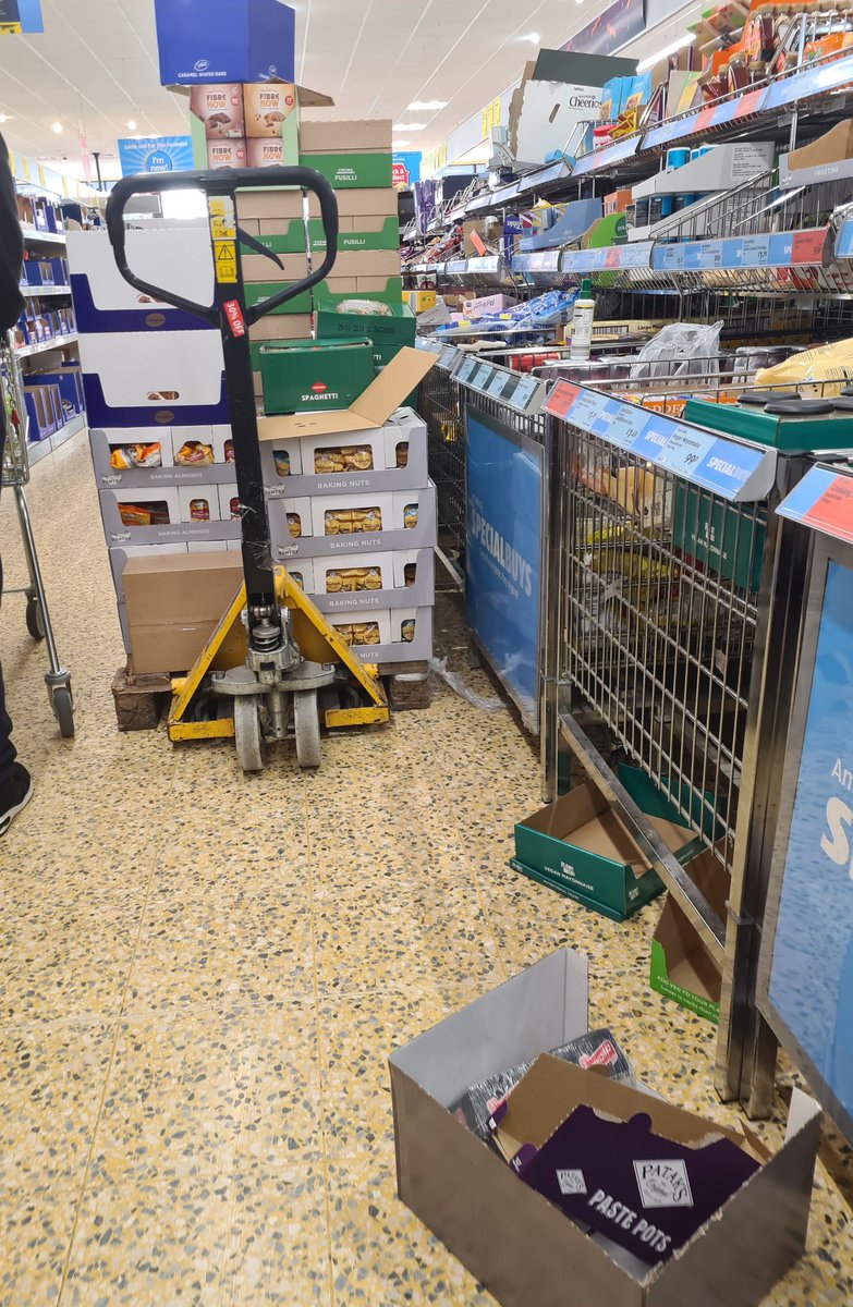 fizliz20's tweet photo. Every week I inform @AldiUK about the St Neots store being cluttered, blocking wheelchair users, every week I'm told they tell the store manager. Those squash bottles are unsafe & could fall out & hit a child or wheelchair user. I couldn't get to one aisle as u can see. #aldifail https://t.co/bHpEzrSmuQ