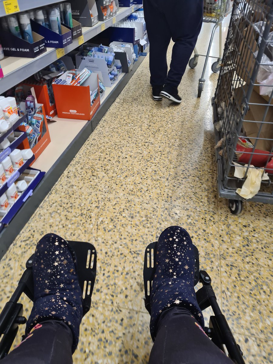fizliz20's tweet photo. Every week I inform @AldiUK about the St Neots store being cluttered, blocking wheelchair users, every week I'm told they tell the store manager. Those squash bottles are unsafe & could fall out & hit a child or wheelchair user. I couldn't get to one aisle as u can see. #aldifail https://t.co/bHpEzrSmuQ