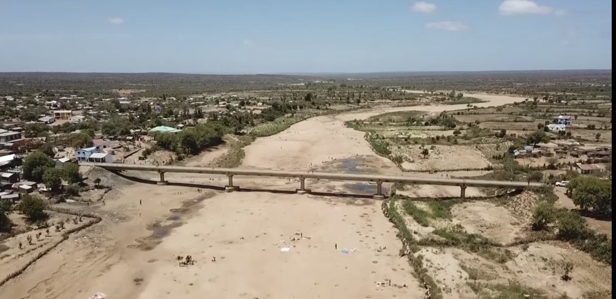 PGDynes's tweet image. No this isn’t people sunning themselves on a beach…these are desperate people digging in what used to be a river looking for water - birds eye river view also.. #Madagascar #ClimateCrisis #famine