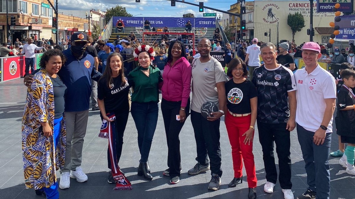 LibbySchaaf's tweet photo. Yesterday in Fruitvale @oaklandroots and @StreetSoccerUSA hosted a game between elected officials and youth – I won’t say who won! TY 
@AGRobBonta, @AsmMiaBonta, and CMs @lorenmtaylor, @reidforoakland &amp; @nikki4oakland for joining! @fifaworldcup - look out! https://t.co/WUQatDLzFE