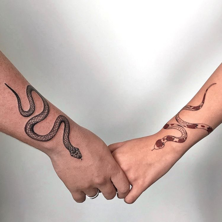 Blue and black snake couple tattoo on the left inner #29 Blue and black snake couple tattoo on the left inner