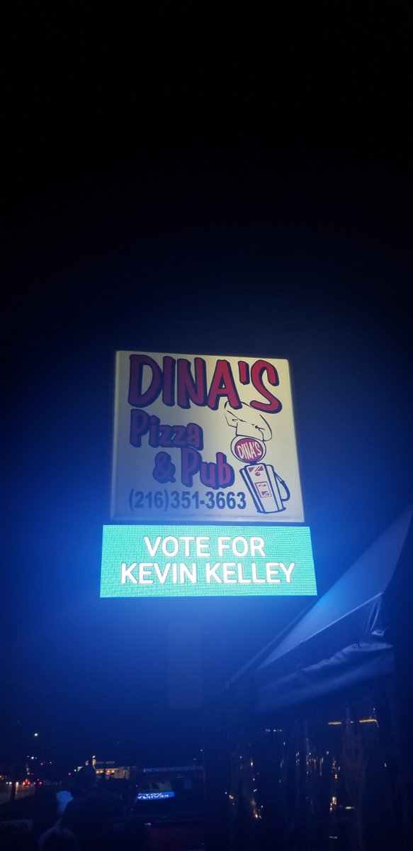 kevinkelleyCLE's tweet photo. After my last dinner with the family, before the election, we saw this sign outside @DinasPizzaCLE. 

Go out and vote! https://t.co/rtEMkYsbPg