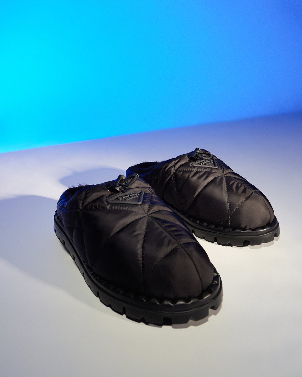 italistofficial's tweet photo. Winter shoe trends we're warming up to! Prada Quilted Nylon Slippers for your cozy nights (in and out). Save up to 45%* off retail price on italist: https://t.co/5tXaeOpUAL #italist #italistdoesitbetter #prada #pradamen #pradashoes #pradaslippers #blackfriday #fw21 https://t.co/J2Qshg7TXR