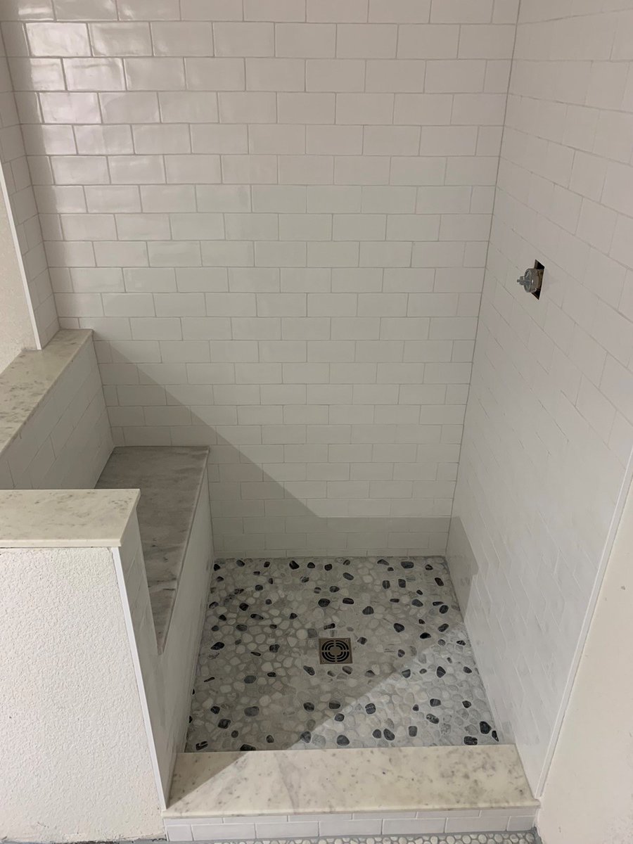 tiling_expert's tweet photo. Schluter shower pan with mosaic tiles on it. Subway tile in the shower surround with schluters on all open edges. Solid surfaces on the curb, bench, and the pony wall. Mosaic tiles on the bathroom floor.

#experttouchtiling #denvertiles #showers #mosaictiles https://t.co/M4d5XkdjZj