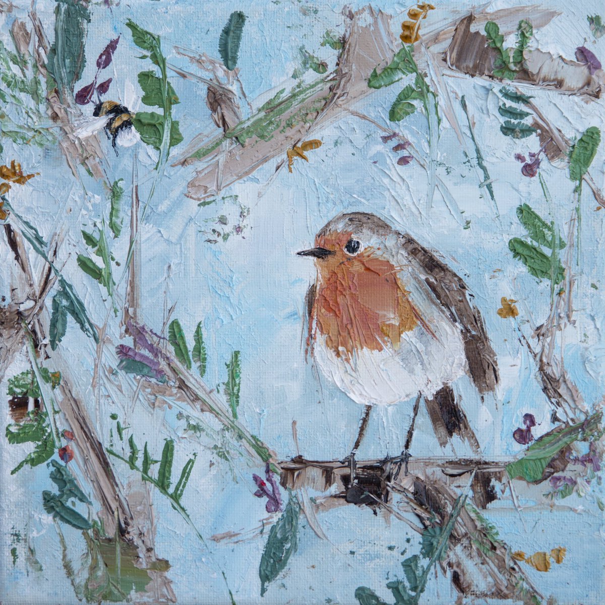 Robin had met a lovely new person. He noticed that his new friend was a little sad. He wasn’t sure why, but he thought just being there with them and keeping them company for a while would make the world of difference. 
As the person began to smile, robin’s heart began to sing.