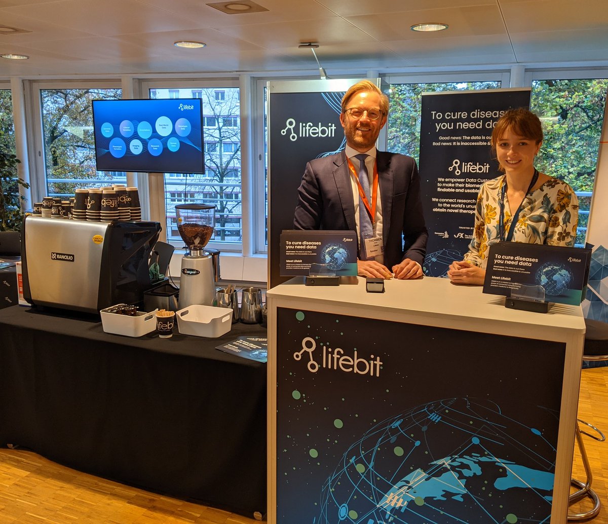 lifebitAI's tweet photo. Attending @Biodata_world today? Come meet Lifebit and grab a barista coffee at Booth E. @ThorbenSeeger, @IngridKnarston &amp; the team are excited to discuss how we are using #BigData, #Federation &amp; #AI to power #PrecisionMedicine. 
#GenomicsLIVE #BioData https://t.co/ouB2EpMMQc