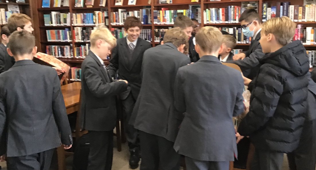 NewHallLib's tweet photo. Christmas has come early to the library! The Library tutor group wrapped up boxes for the @NewHallNHVS Hampers. Christmas music was played, a lot of Sellotape was used and the wrapping paper has all been used up! What a brilliant start to the day. 🌲🥳🎁🎈 https://t.co/SBI1be2dOV