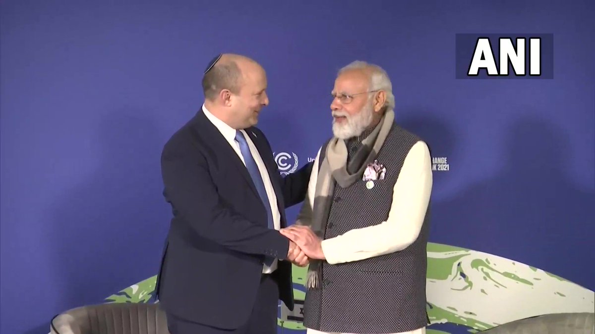 ANI's tweet photo. Prime Minister Narendra Modi holds a bilateral meeting with Israel's PM Naftali Bennett in Glasgow, Scotland. https://t.co/p6rEvtVNvQ