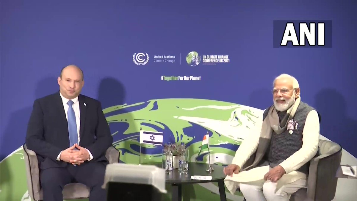 ANI's tweet photo. Prime Minister Narendra Modi holds a bilateral meeting with Israel's PM Naftali Bennett in Glasgow, Scotland. https://t.co/p6rEvtVNvQ