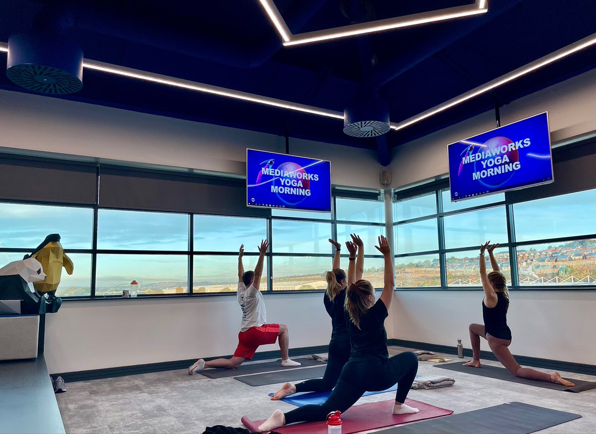 mediaworksuk's tweet photo. The Mediaworks team kicked off the day with an early morning yoga session! 🧘‍♀️

This was live-streamed across three countries meaning four of our offices could get involved together and practice their warrior poses. 🚀

#wellbeingatwork #officeyoga #mediaworks https://t.co/IFBqy5CpSW