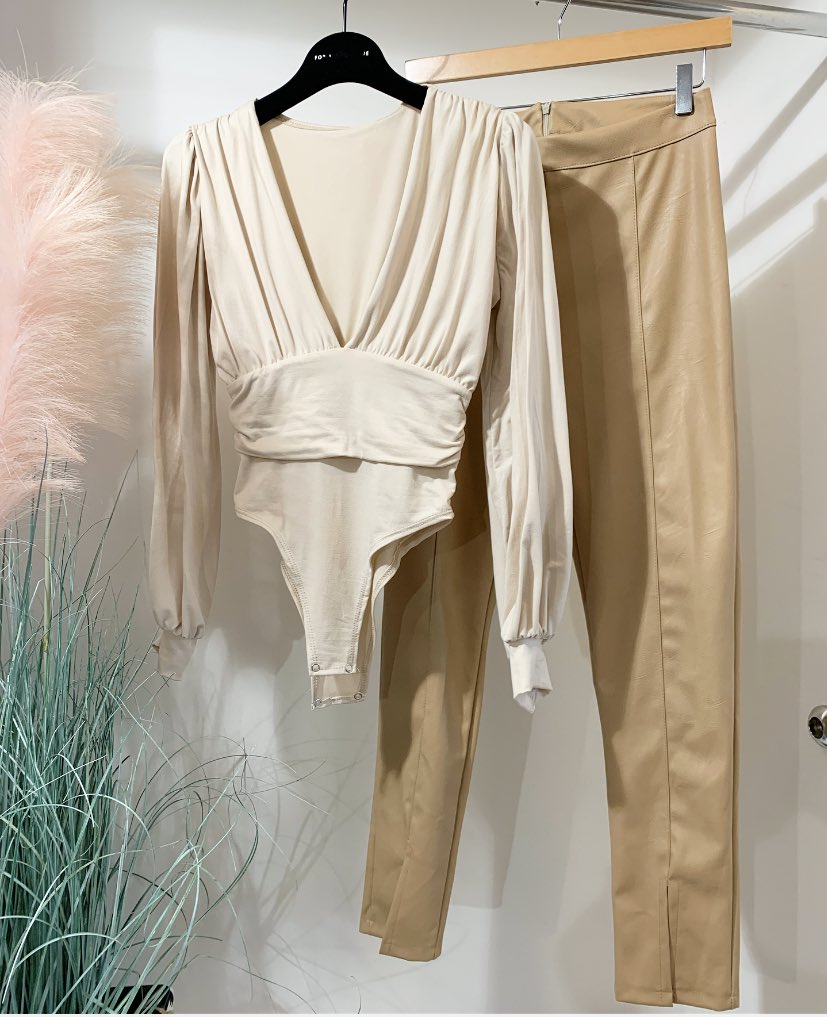 LibertyBluff's tweet photo. Neutral agreement 💭 how amazing is this outfit 🤩 grab this before it goes .. our best selling bodysuit £20 one size (8/12) fit teamed up with these fabulous PU split front trousers £28.99 sizes SML 🤍✨ SHOP NOW https://t.co/5ciraWOZkD https://t.co/S3ASJMGfGv