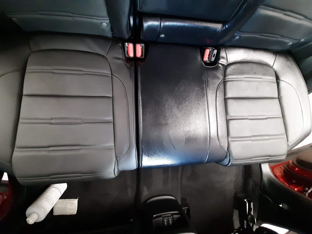 Overhead view of an SUV bench seat receiving leather conditioning. You can see the untreated left side vs. the treated luster on the right side😎

This service comes in all our car detailing packages: jrekautocare.com/packages