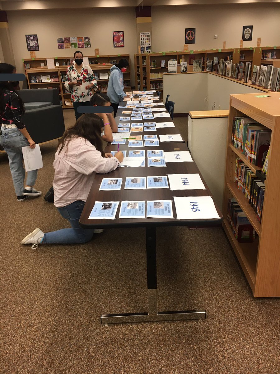 LibraryBriscoe's tweet photo. Our library has turned into a museum for the week. 8th grade is coming down to check out stations about Holocaust to learn about the atrocities that happened, hear from those who experienced it, and learn about propaganda. @NISDBriscoe @NISDLib @QueenB_ela https://t.co/0ej4Dy6pTL