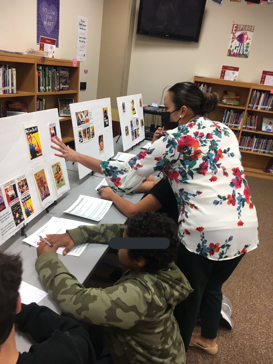 LibraryBriscoe's tweet photo. Our library has turned into a museum for the week. 8th grade is coming down to check out stations about Holocaust to learn about the atrocities that happened, hear from those who experienced it, and learn about propaganda. @NISDBriscoe @NISDLib @QueenB_ela https://t.co/0ej4Dy6pTL