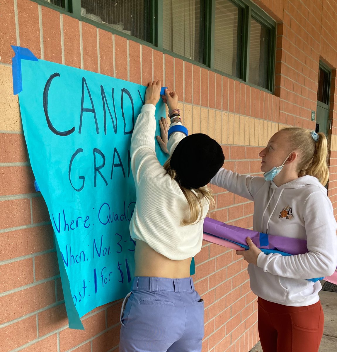PHOTO OF THE DAY: Student Government students, Lindsey Snyder and Izzie Hillman, hang up a poster for Candy Grams during first lunch.

Photo by Justin Ha
