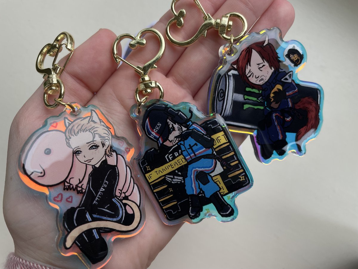 astrandofgold's tweet photo. Look what arrived!! I’ll be updating the shop with these keychains and holo stickers, and just in time for the holidays too! Depending on what you all think about the totes, they might make an appearance on Etsy too 👀 

#DeathStranding #ArtistsOnTwitter https://t.co/nmCqKpZjET