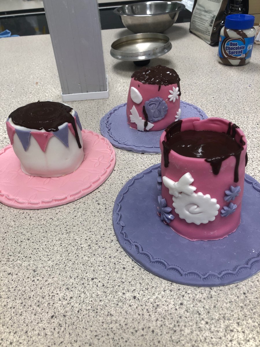 cardi_he's tweet photo. Cake craft making some ‘cup’cakes with a chocolate ganache filling practicing skills needed for their Christmas cakes which we are making this week!! Well done 👍 https://t.co/iMVLyzG05X