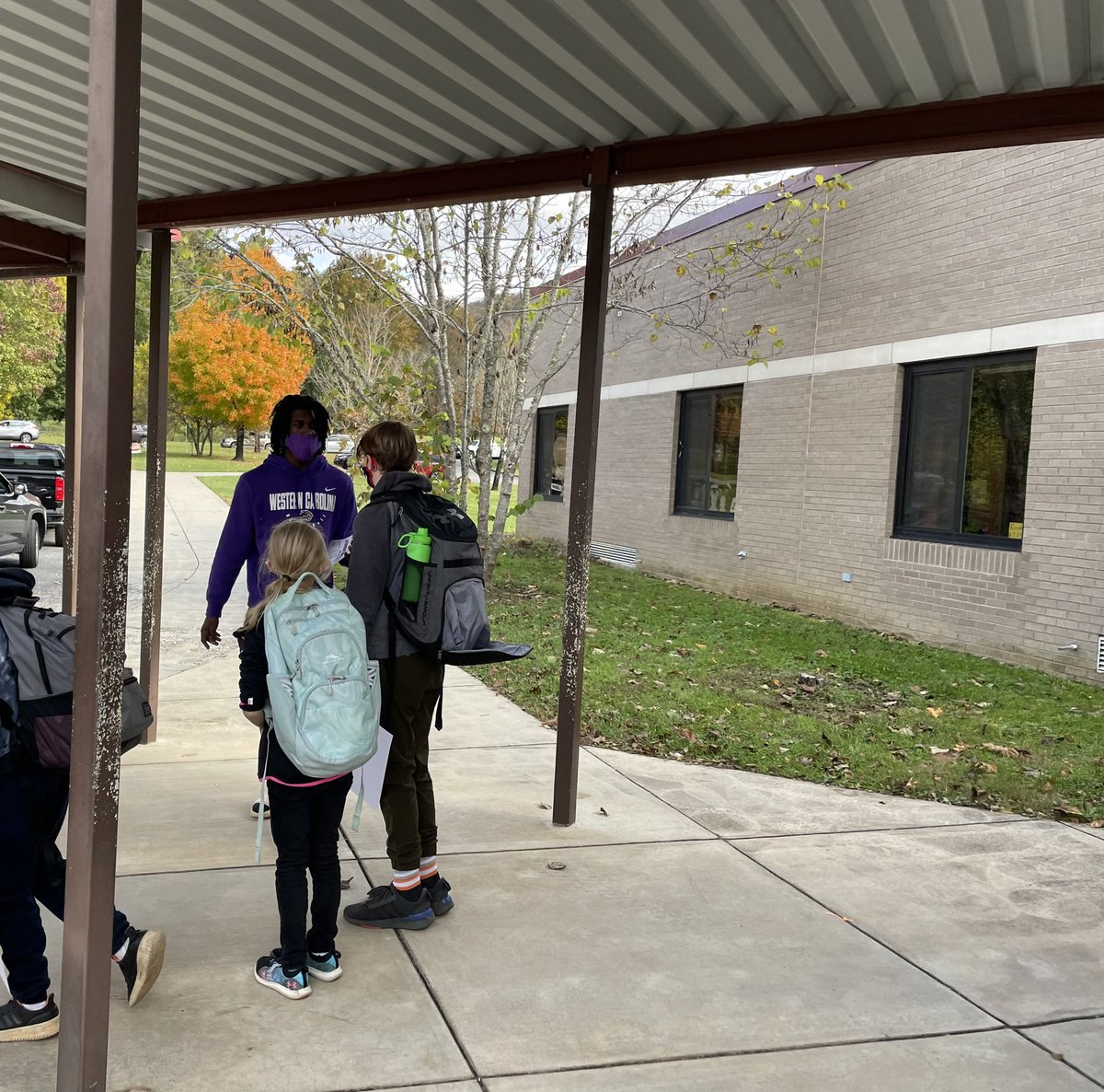 CatamountMBB's tweet photo. The Catamounts made a positive impact on their community this morning &amp; afternoon at Cullowhee Valley School!

#TJDK https://t.co/FwovBfcPap