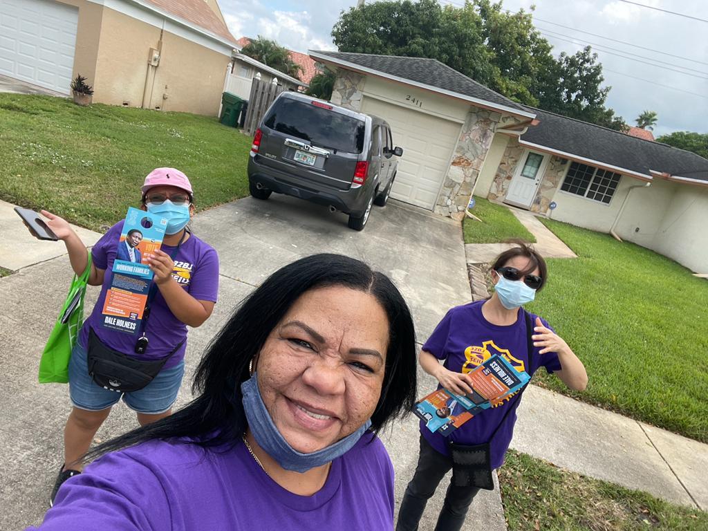 32BJFlorida's tweet photo. 32BJ airport workers and janitors have knocked on thousands of doors for working class champion @HolnessforFL for Congress. You can still do your part and #VOTE in the #District20 Special Election! Polls close at 7PM! Find your voting location here: https://t.co/ISeqlYU0Mk #1u https://t.co/ajtIhPA5ZL