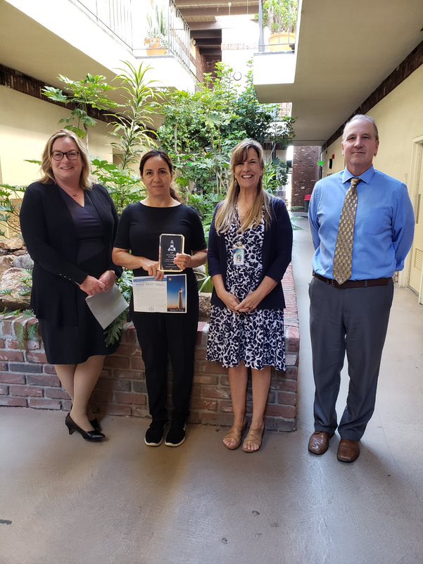 StaceyAdame3's tweet photo. Superintendent Anne Staffieri, co-principal Tom Allison, and I honored EAS Lighthouse Award winner, Vicky Torres, today. Due to Vicky’s hard work, our site is the jewel of the district! @EdEscondido @EUHSD @ETCN_SanDiego #adultEDU https://t.co/kwLqZt1w8g