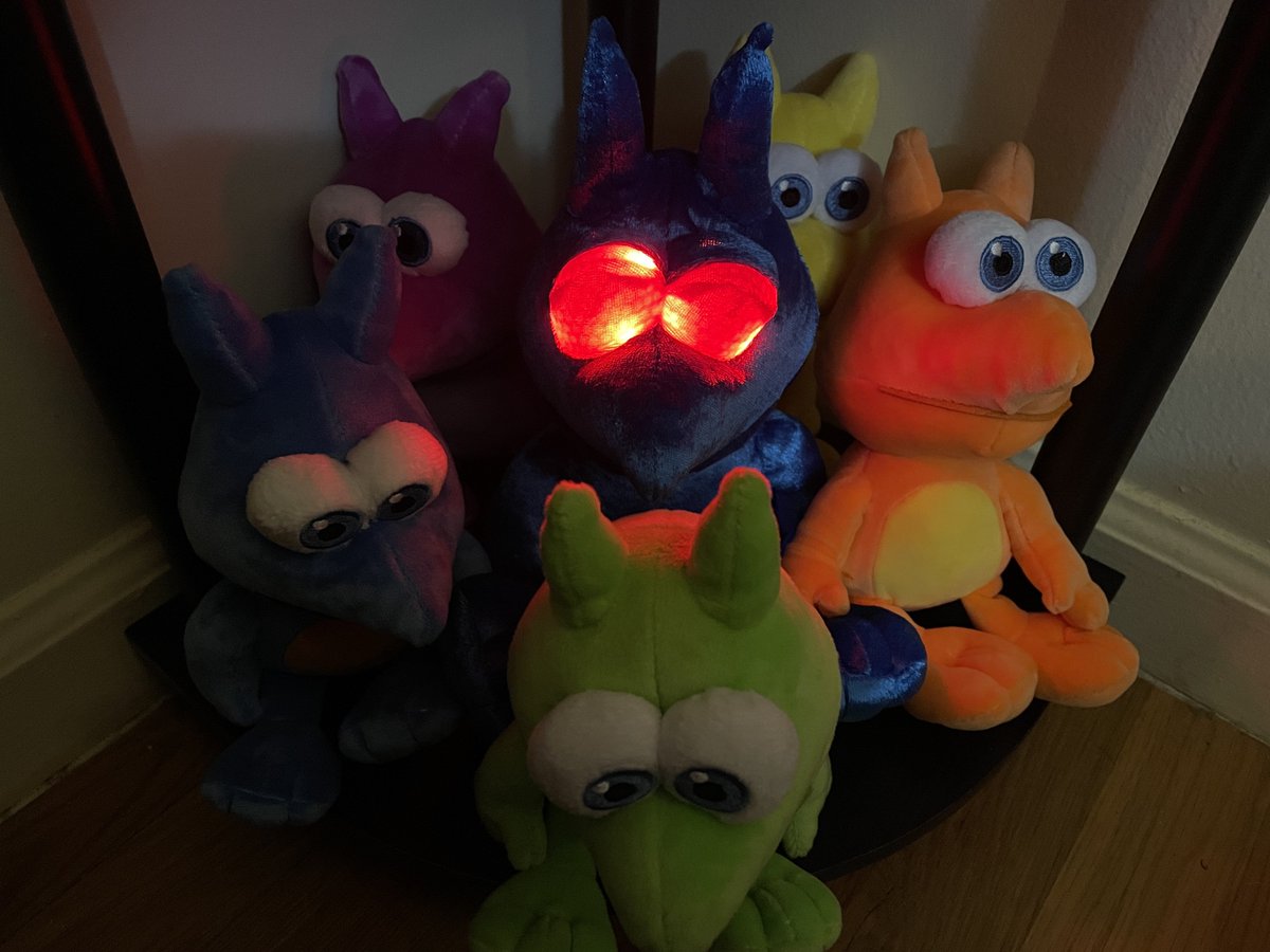 The Jinjonator plush flanked by the five regular Jinjo plushes from Fangamer.