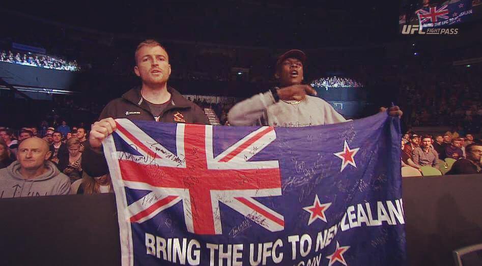 November 27, 2016 Israel Adesanya with the New Zealand flag and the signature 