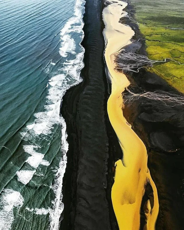 RebeccaH2030's tweet photo. Blue sea, black beach, yellow river and green fields meeting together in Iceland.
Credit: IG user sebastianmzh
#Tiredearth https://t.co/U5u63Mxzv8