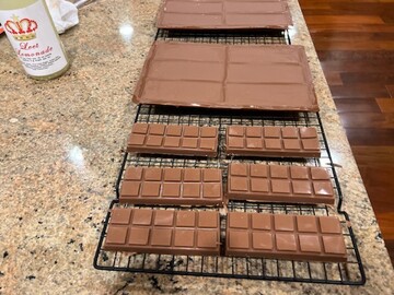 Belgian chocolate bars everyone? This is the chocolate for your stress. We'll be giving it as a token for our stickers.