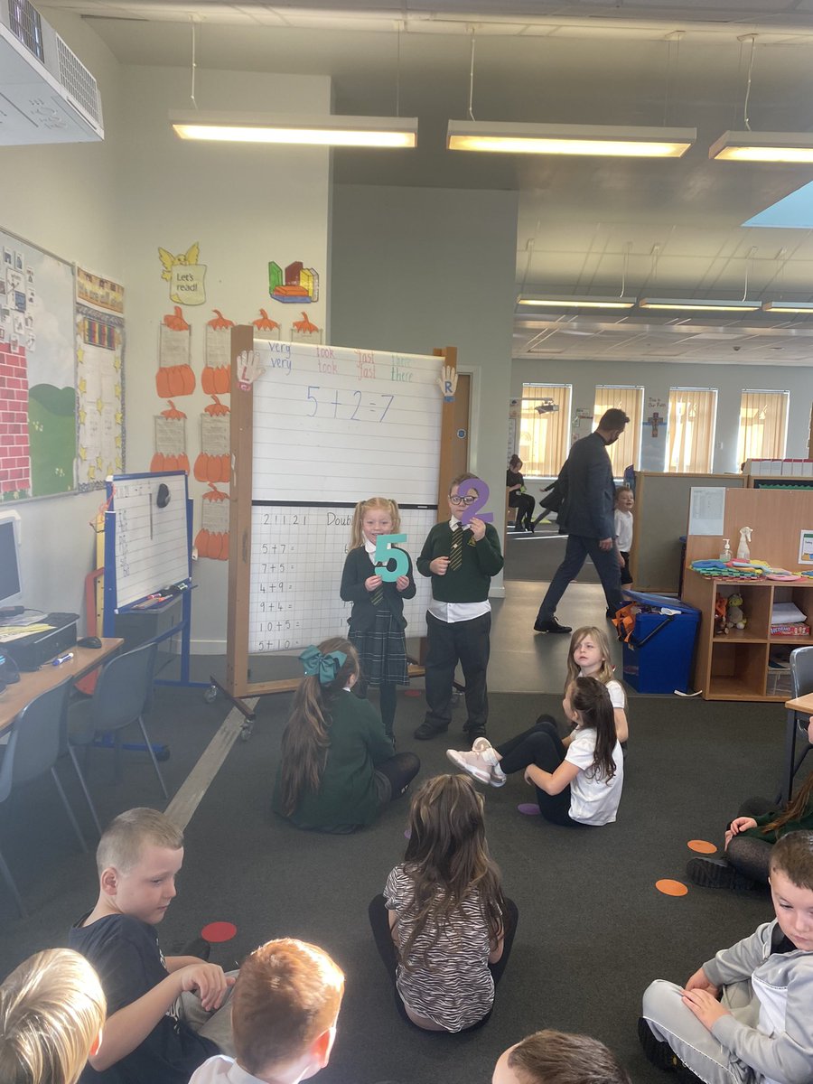 NicolsonMrs's tweet photo. Primary 2 are learning that if we switch round the addends in a sum, we still get the same answer. We also enjoyed some active fast finisher tasks, like snakes and ladders and filling out blank 100 number squares. 🔢➕@StPatsKilsyth https://t.co/OGEXkWdda6