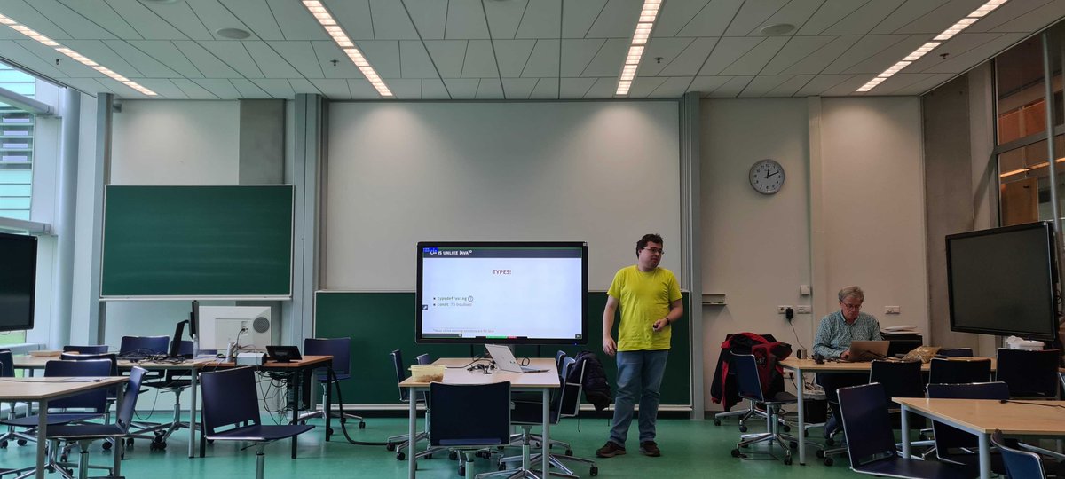 _sustrainable_'s tweet photo. Richárd Szalay is delivering his talk on "Sustainable code maintenance: using strong types in C++" at @_sustrainable_'s first teacher training in Nijmegen. https://t.co/PhMFhSNjh3