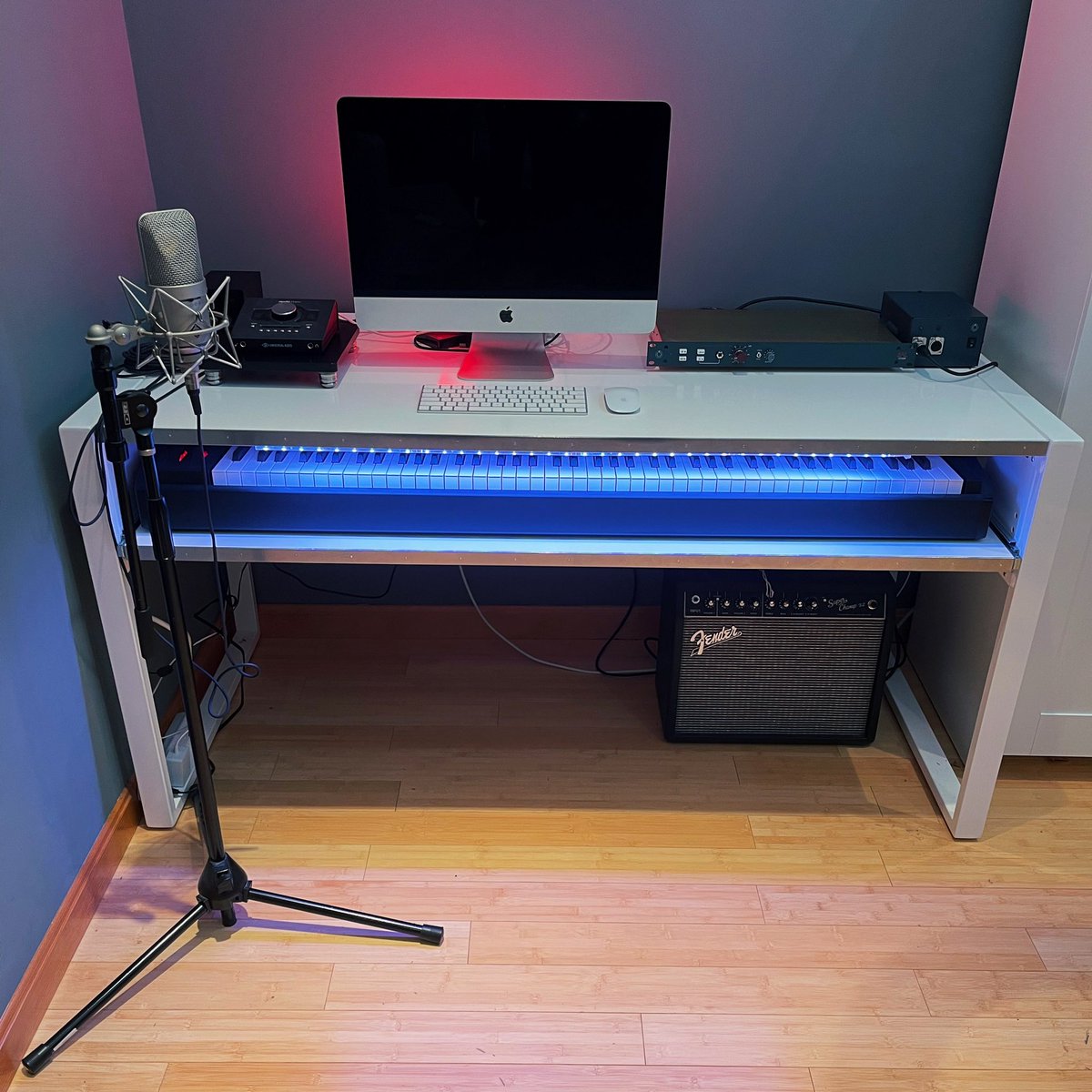 MusicFan_33's tweet photo. My home recording setup in 2020 (left) and 2021 (right) (after a few upgrades and updates) (microphone, microphone preamplifier, keyboard, and lighting). https://t.co/MateRSbMeu