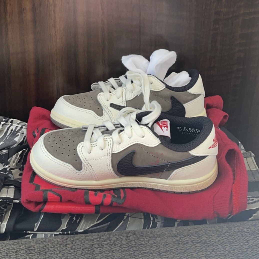 saint's tweet image. Kylie Jenner showing off some 2022 Cactus Jack 1's