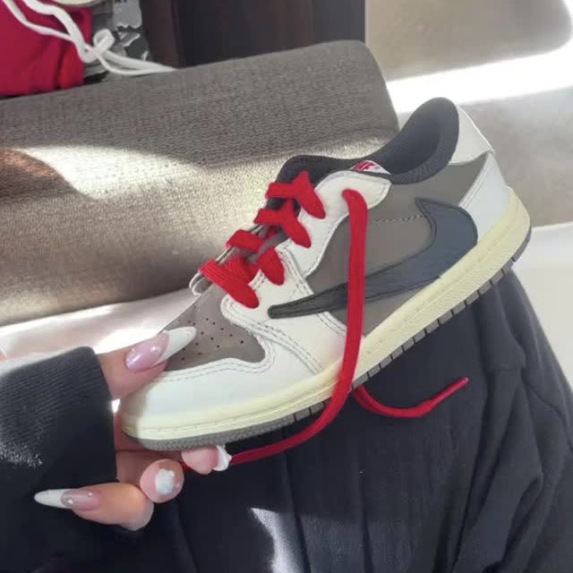 saint's tweet image. Kylie Jenner showing off some 2022 Cactus Jack 1's