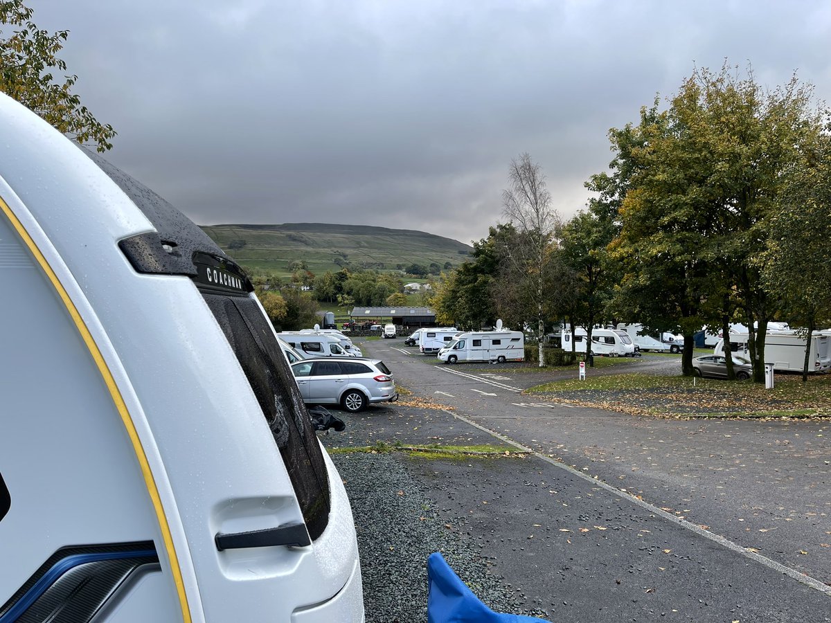 Grey skies and wet roads, but we’re set up at Hawes <a href="/candmclub/">Caravan and Motorhome Club</a> site. Caravan clean thanks to our <a href="/TailoredCovers/">Specialised Covers</a> Tow Pro Elite, and caravan levelled in a couple of minutes <a href="/EPHydraulics/">E&P Hydraulics UK</a> (nearside wheel off the ground). #Relax!