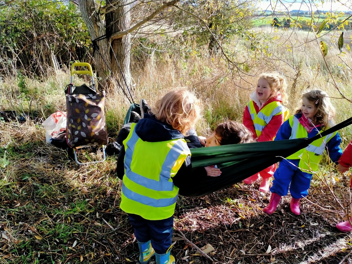 CherryTreeEYC's tweet image. This week we had a group of parents and children working with Gordon from Learning from landscapes. We had great fun building a shelter at our allotment, having our snack in it ,risk assessing the ground behind allotment and putting up a hammock.