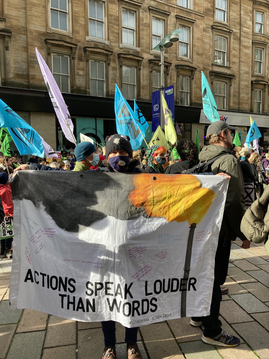 ASLTWScot's tweet photo. Our #FlareToCop banner joined #StopTheGreenwash protest @ #COP26Glasgow to call out dirty #Polluters #Exxon #Shell who greenwash solutions & lie to carry on #Polluting #KickPollutersOut
#JustTransition to protect ppl,workers & planet #ClimateJustice #ActionsSpeakLouderThanWords https://t.co/QgusUYgg0Y