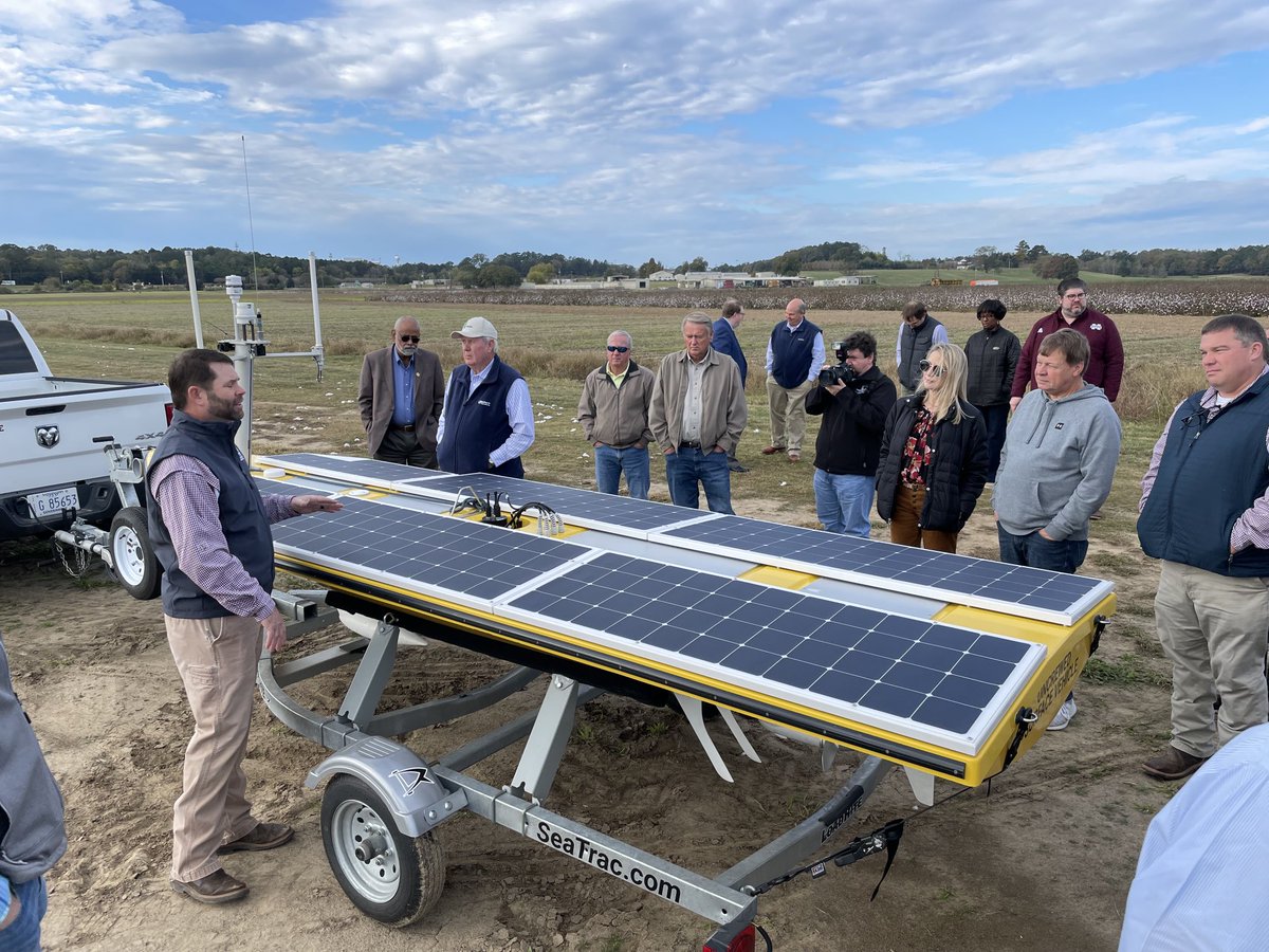 TheDirtDude's tweet photo. Only my 2nd day on the job ⁦@MSU_AG⁩, and already meeting congressional delegates! Dr. Daniel Chesser explains a drone boat that autosamples for water quality. Very cool. https://t.co/jdtPmULW2B