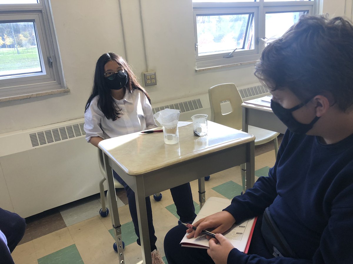 Grade 8 students @stjeromestcdsb using problem solving skills to test a water system device to make unclean water clean #SCIENTIST #WaterSystems